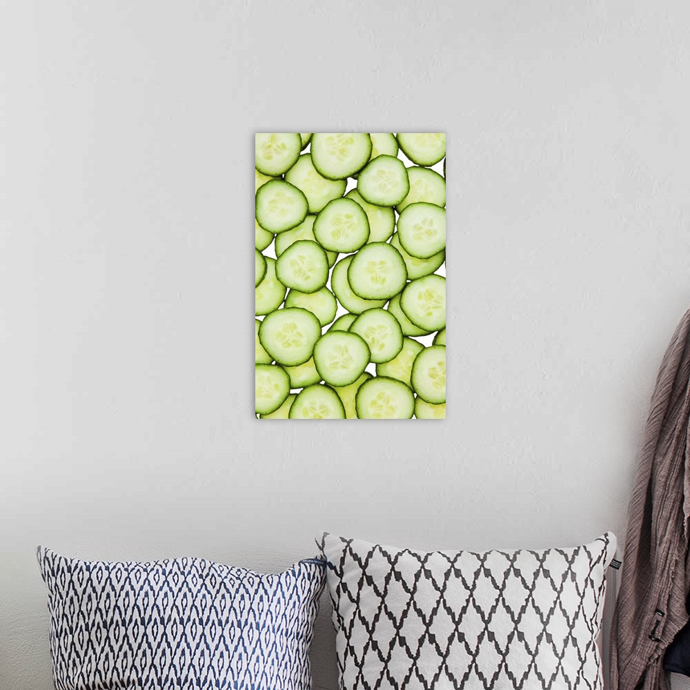 A bohemian room featuring Full frame of sliced cucumber, on white background, cut out