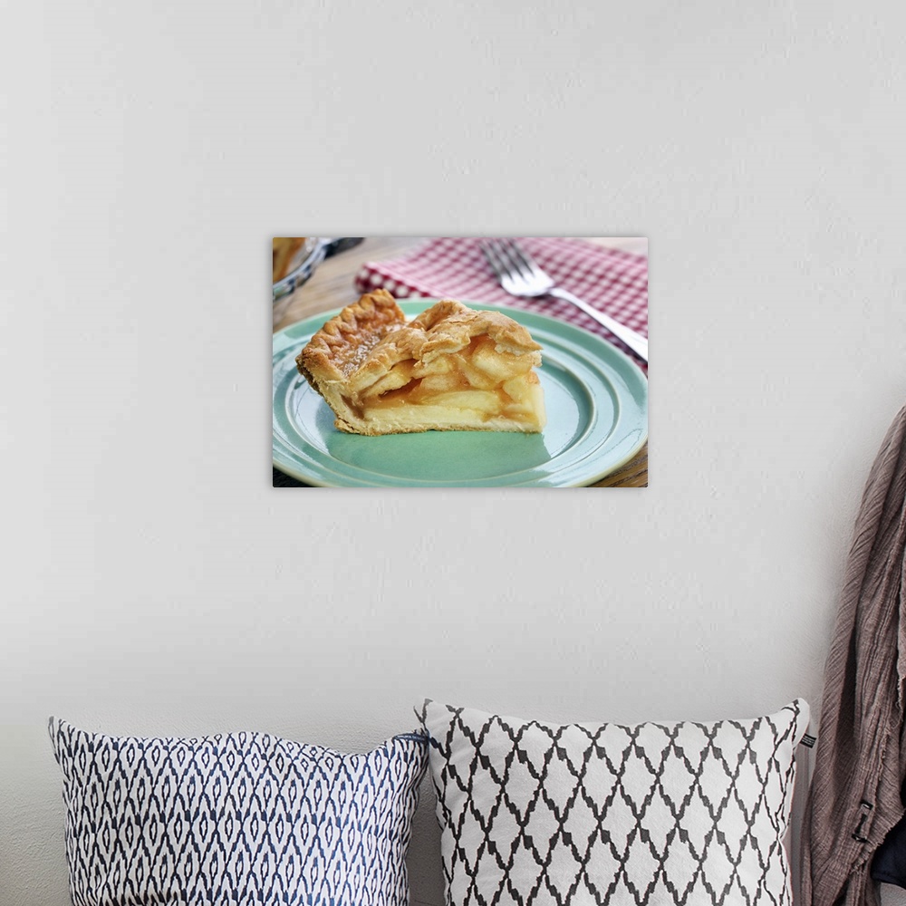 A bohemian room featuring Slice of fresh baked apple pie on plate