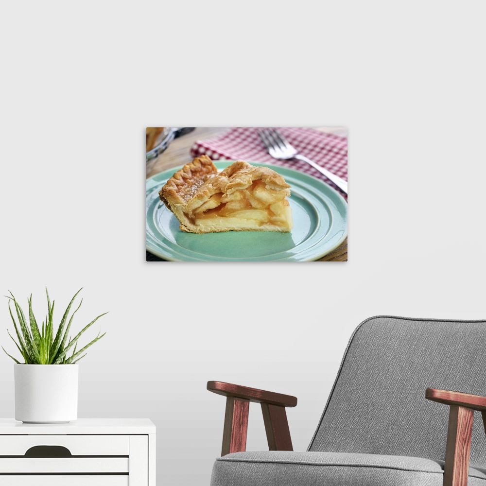 A modern room featuring Slice of fresh baked apple pie on plate