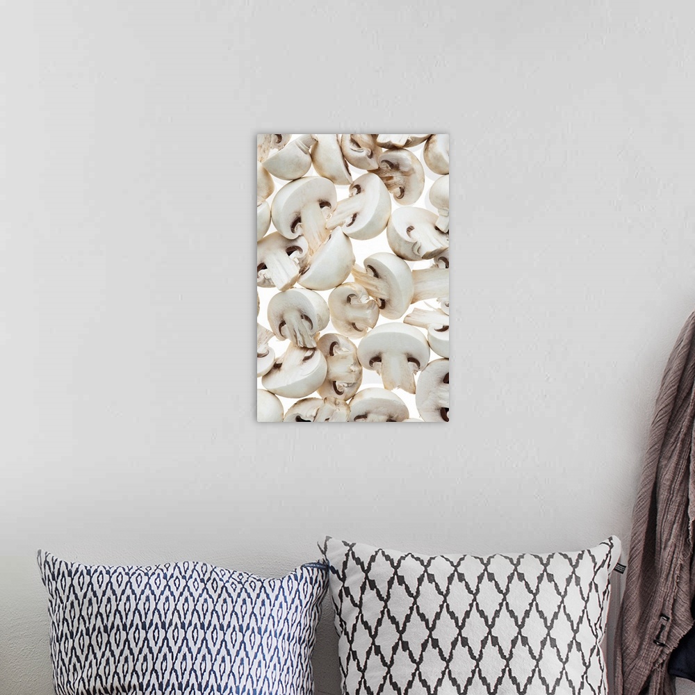 A bohemian room featuring Sliced button mushrooms (agaricus bisporus), on white background, cut out