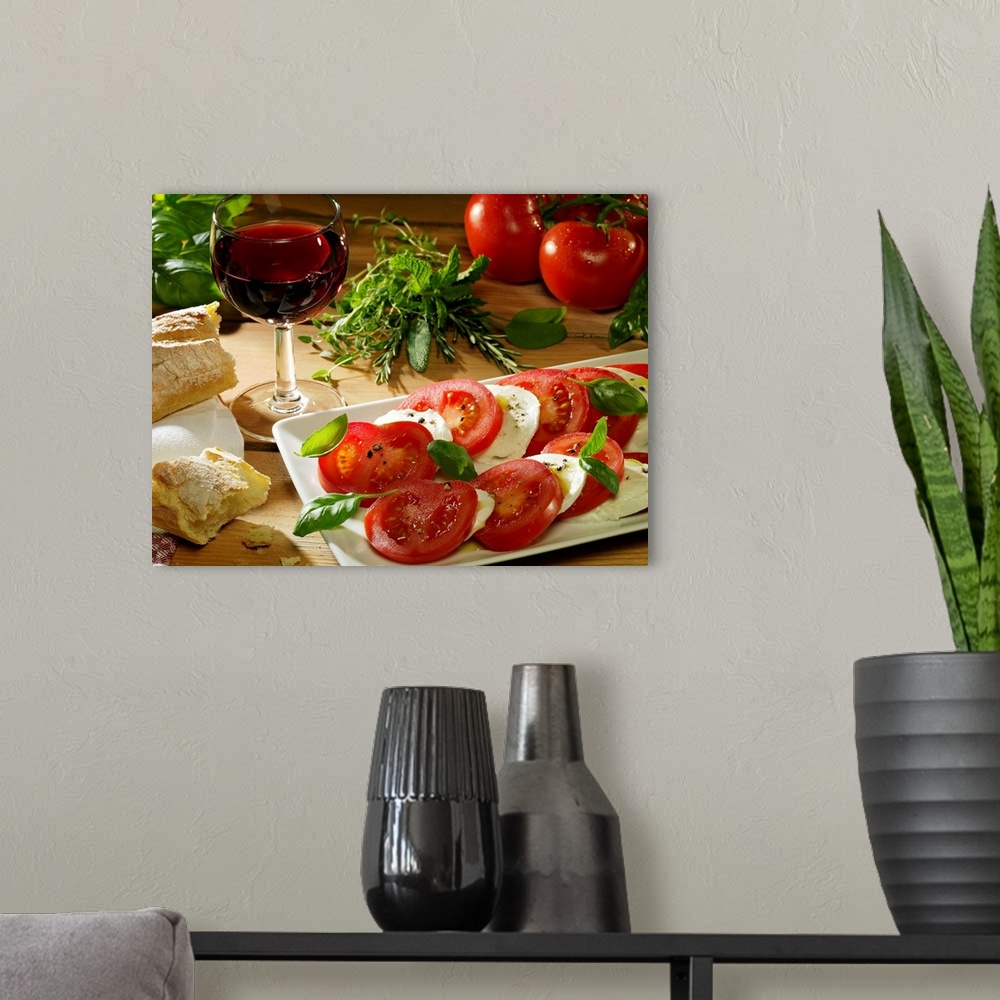 A modern room featuring This photograph is a still life of traditional Italian food. A wood table is covered with crusty ...
