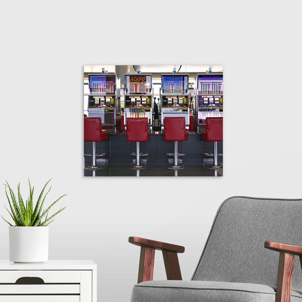 A modern room featuring Slot machines