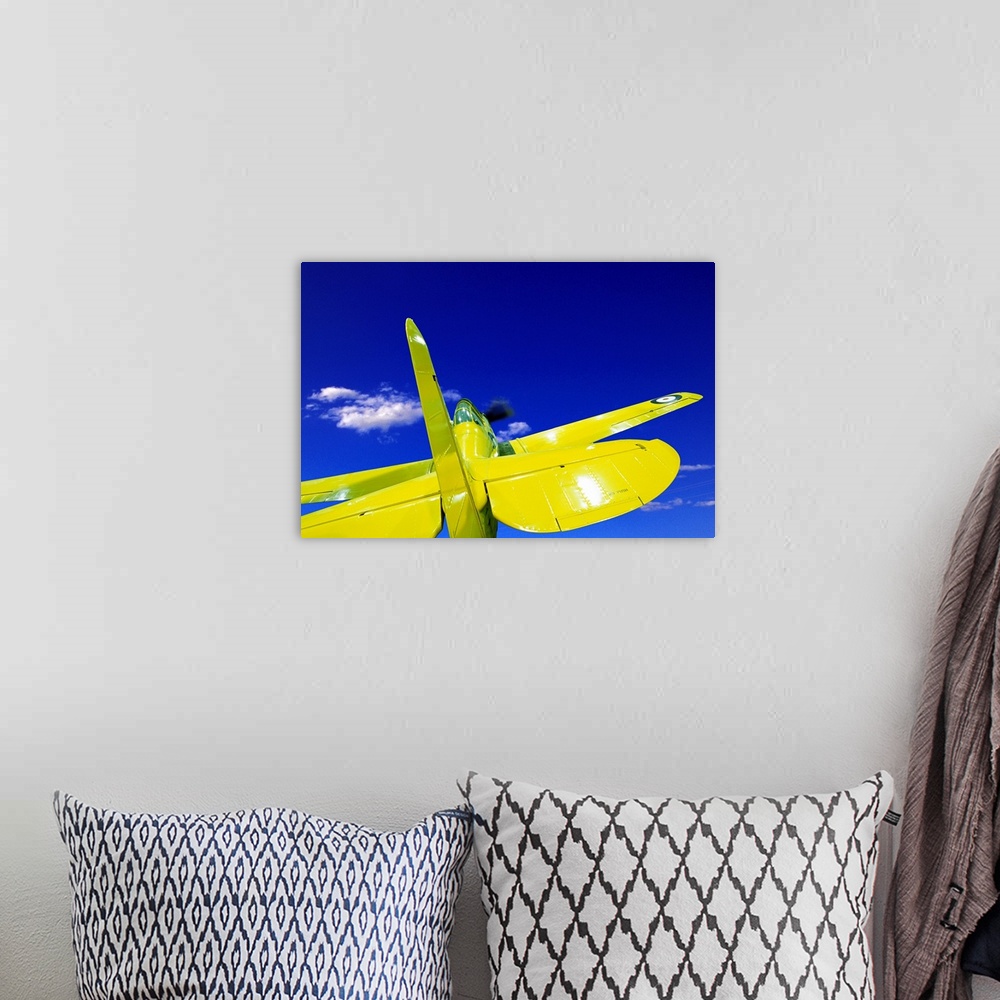 A bohemian room featuring Small yellow airplane