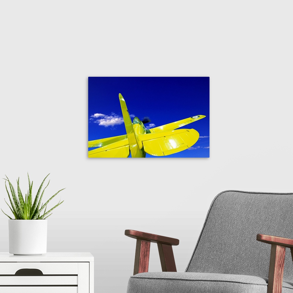 A modern room featuring Small yellow airplane