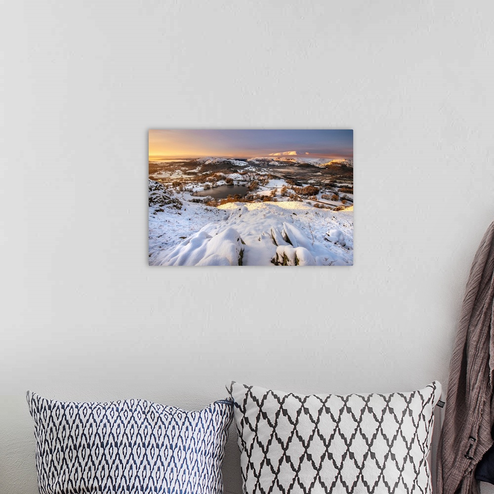 A bohemian room featuring View from Loughrigg Fell on a winter morning with golden light bathing the snow covered landscape...