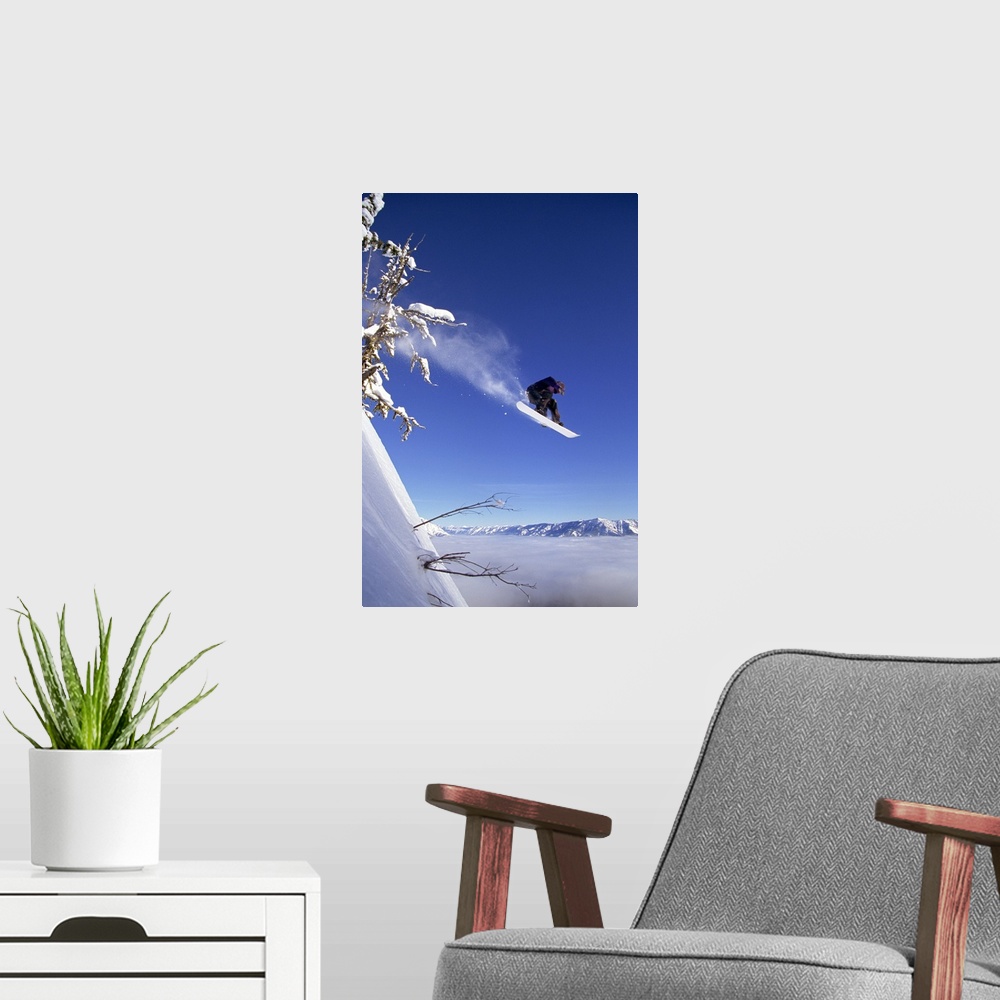A modern room featuring Snowboarder in mid-air