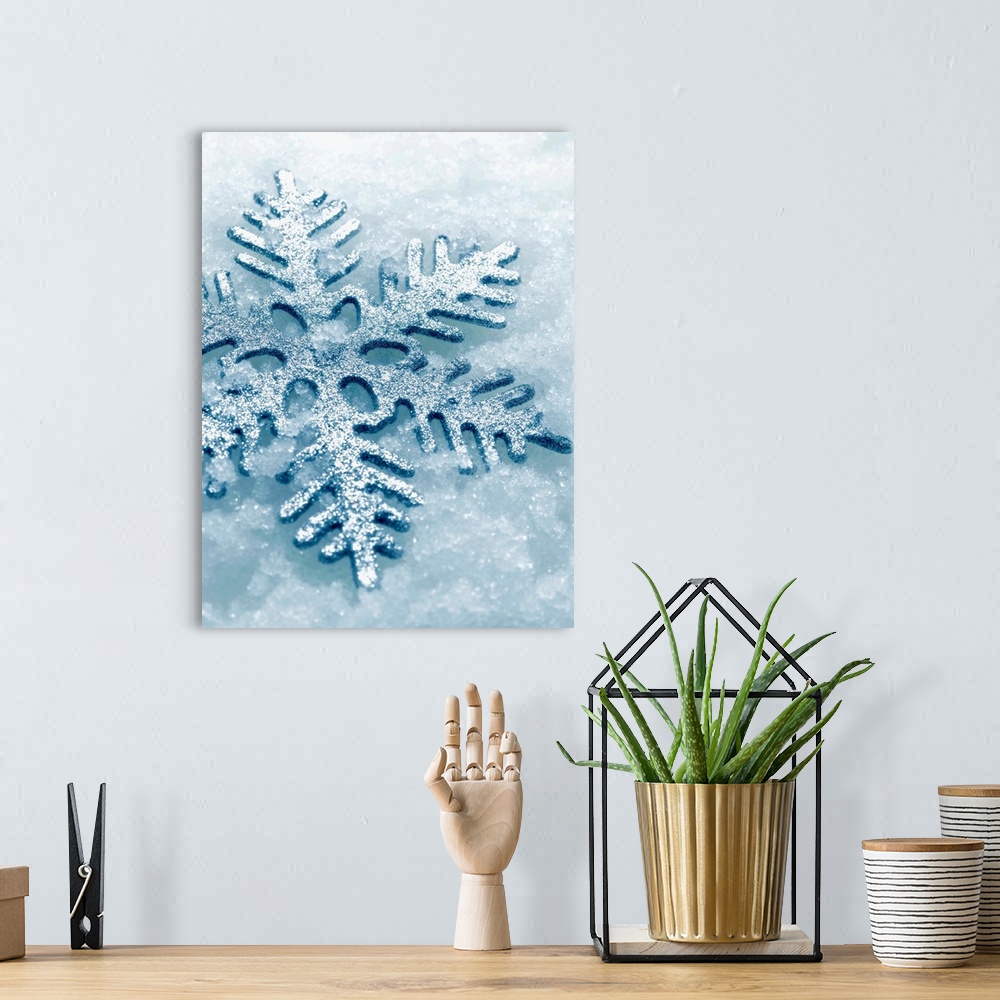A bohemian room featuring Snowflake Shaped Christmas Ornament Lying In The Snow
