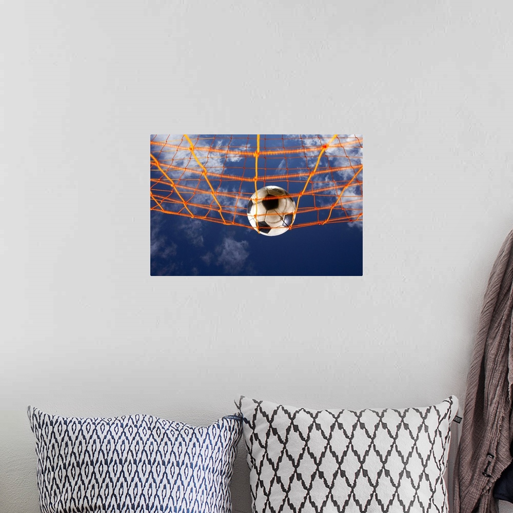 A bohemian room featuring Soccer Ball Going Into Goal Net