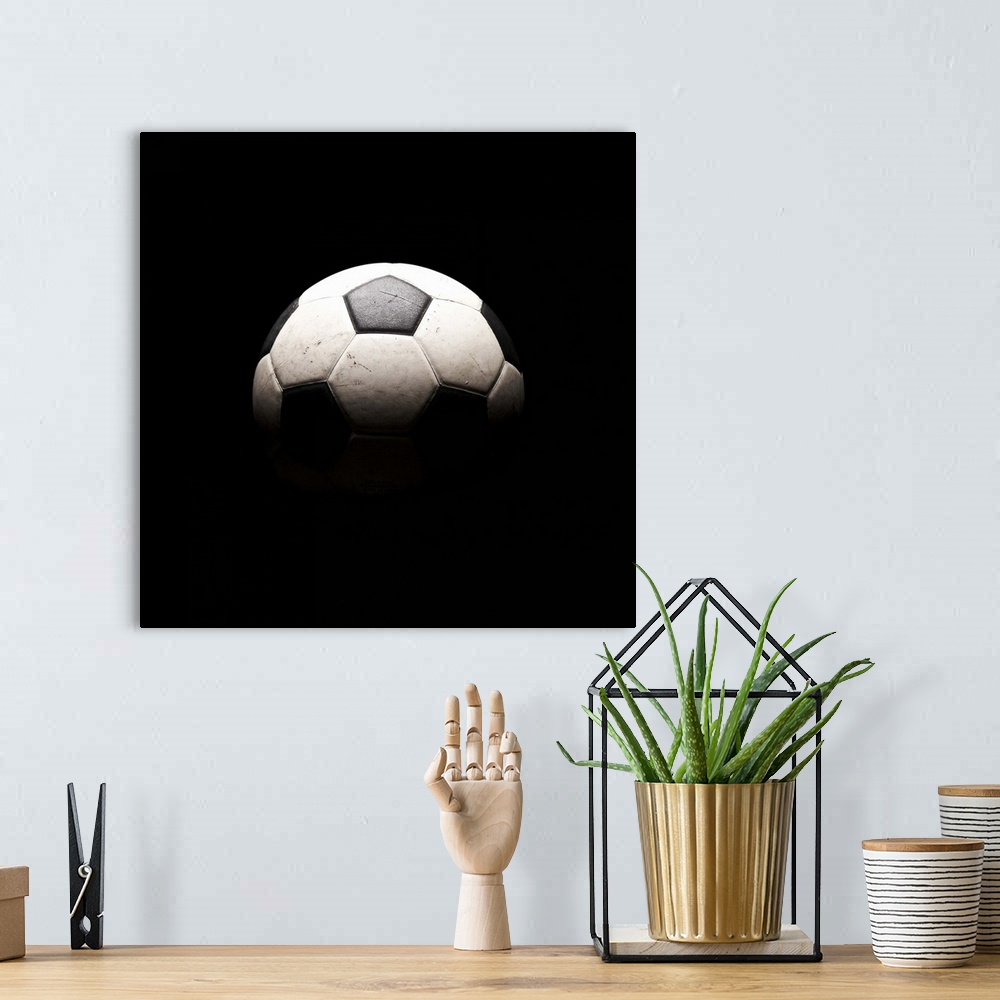 A bohemian room featuring Soccer ball in shadows