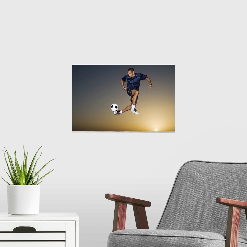 A modern room featuring This athletic wall art for a childos room or office shows a man in the air contorting his body to...