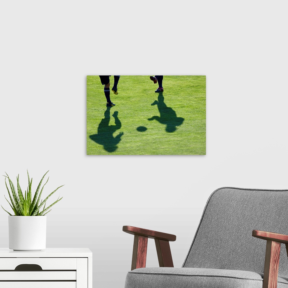 A modern room featuring Soccer players doing drills.