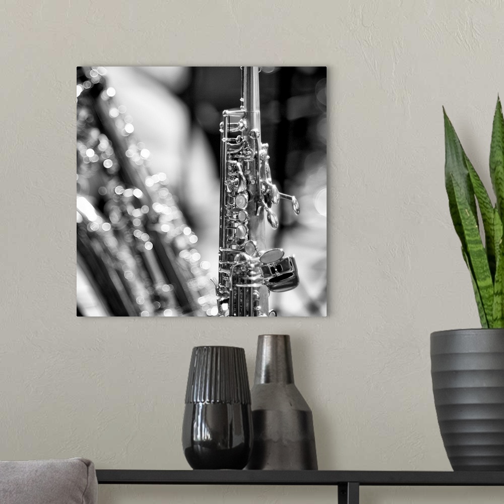 A modern room featuring Soprano Saxophone with single reed mouthpiece and flared bell