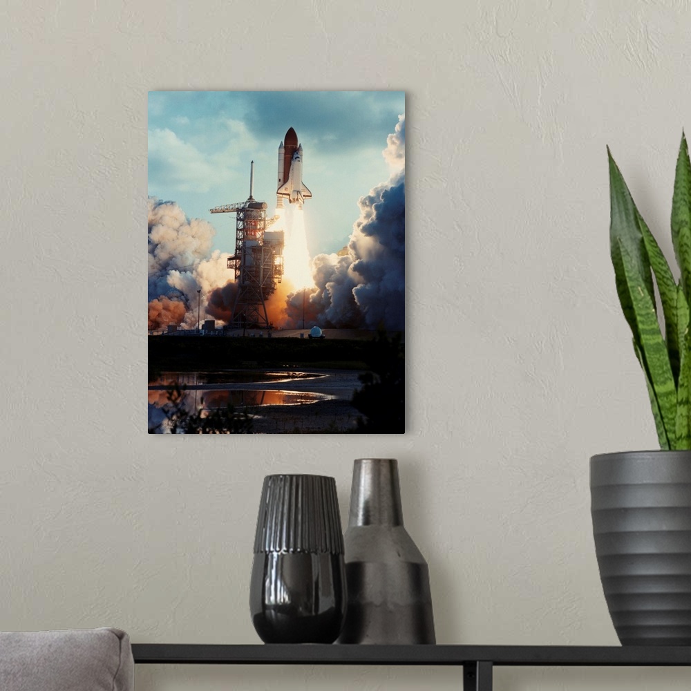 A modern room featuring The seventh launch of the Space Shuttle and the second lift-off of the Orbiter Challenger occurre...