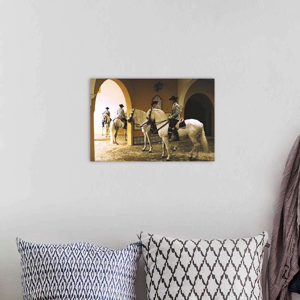 A bohemian room featuring Spain,Jerez de la Frontera,School of Equestrian Art,four men on horses