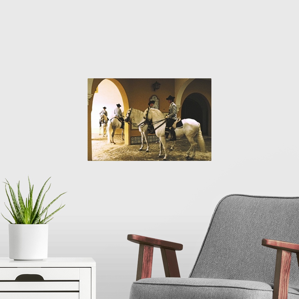 A modern room featuring Spain,Jerez de la Frontera,School of Equestrian Art,four men on horses
