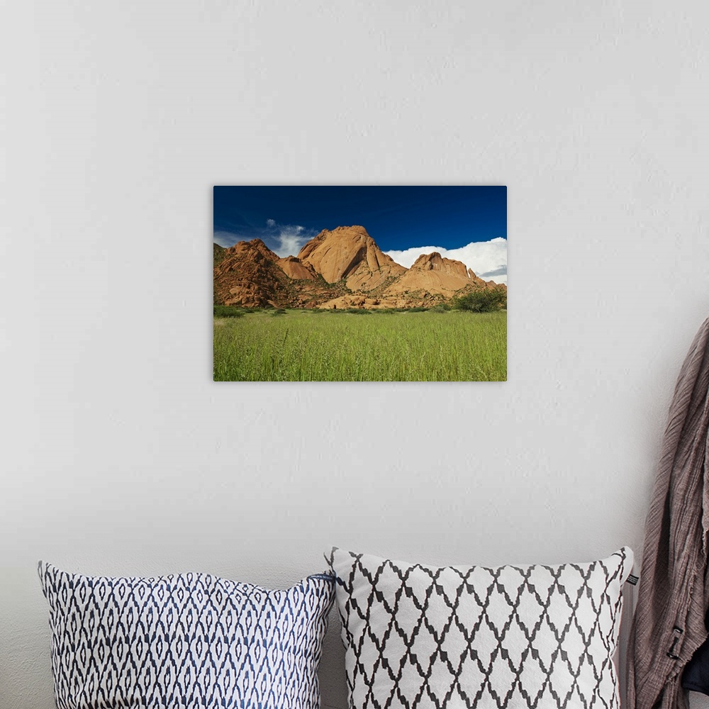 A bohemian room featuring Spitzkoppe or Spitzkuppe, arid mountain landscape of granite rocks, Matterhorn of Namibia, Namibi...