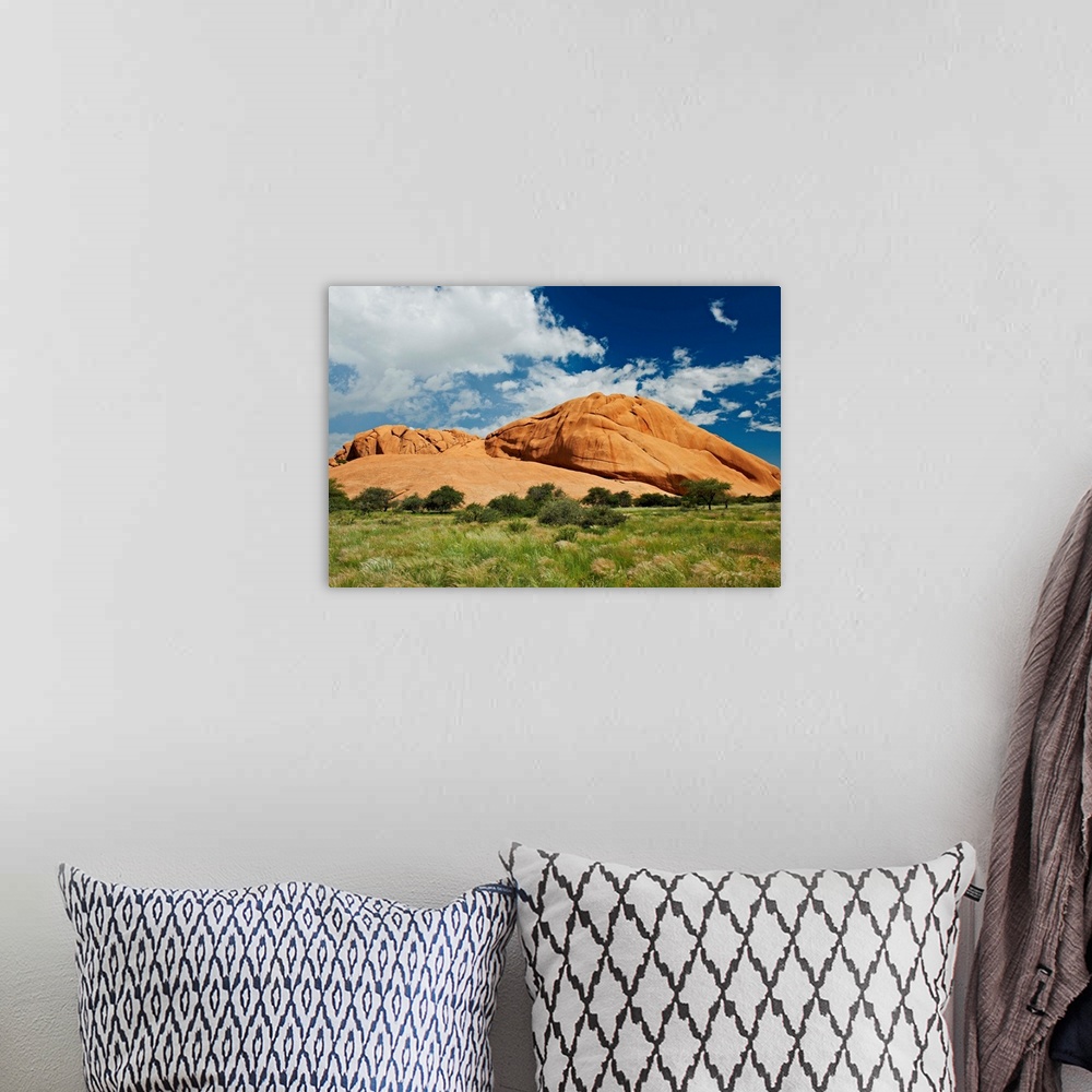 A bohemian room featuring Spitzkoppe or Spitzkuppe, arid mountain landscape of granite rocks, Matterhorn of Namibia, Namibi...