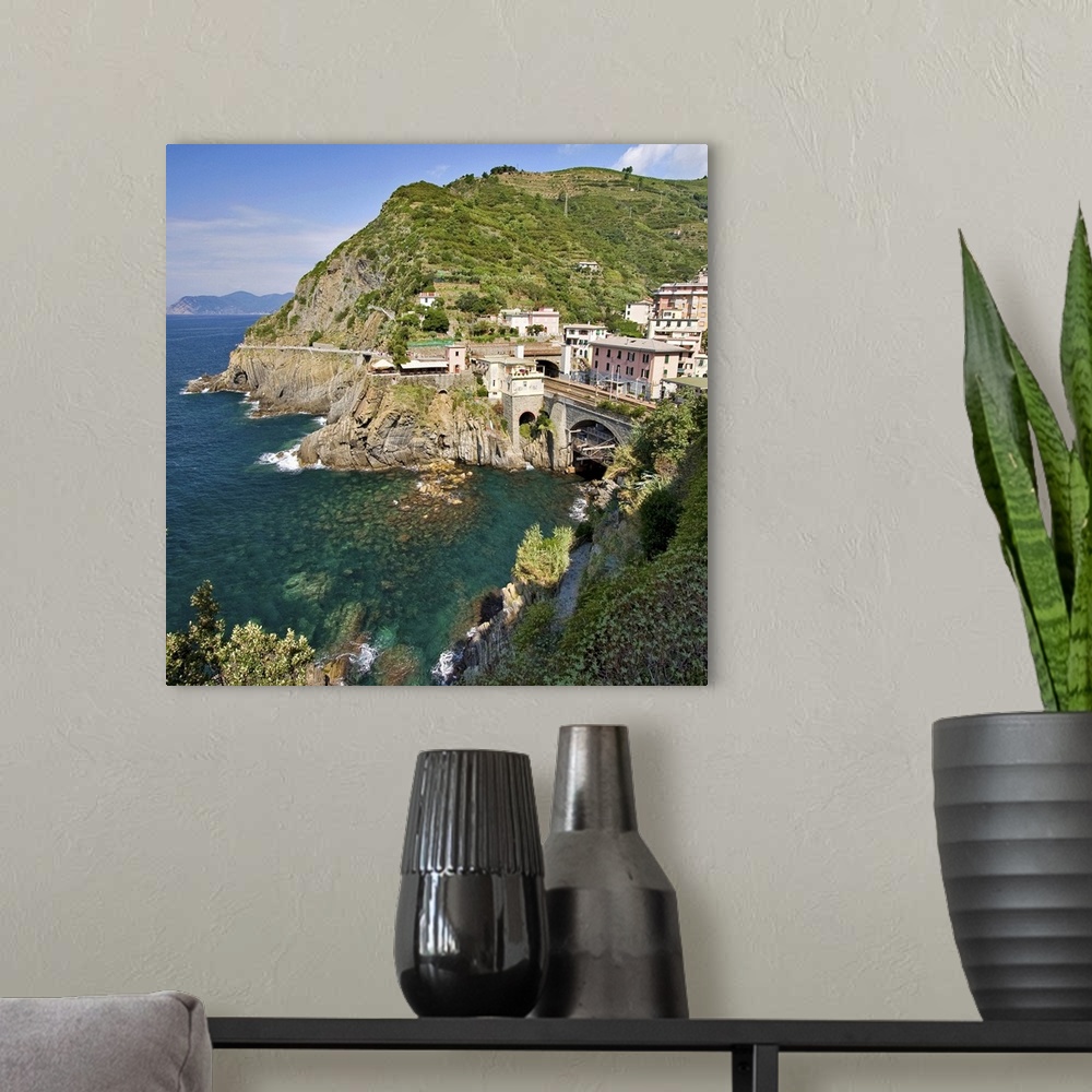 A modern room featuring Square crop of railway tunnel in coastal village part of Cinque Terre, Italy.