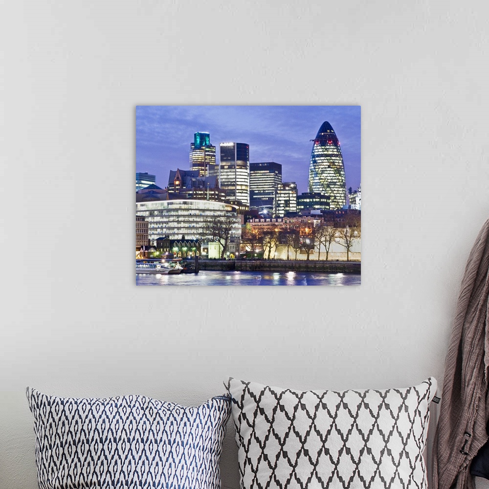 A bohemian room featuring St Mary Axe, also known as the Gherkin, the Cucumber Building and the Swiss Re Building, is a sky...