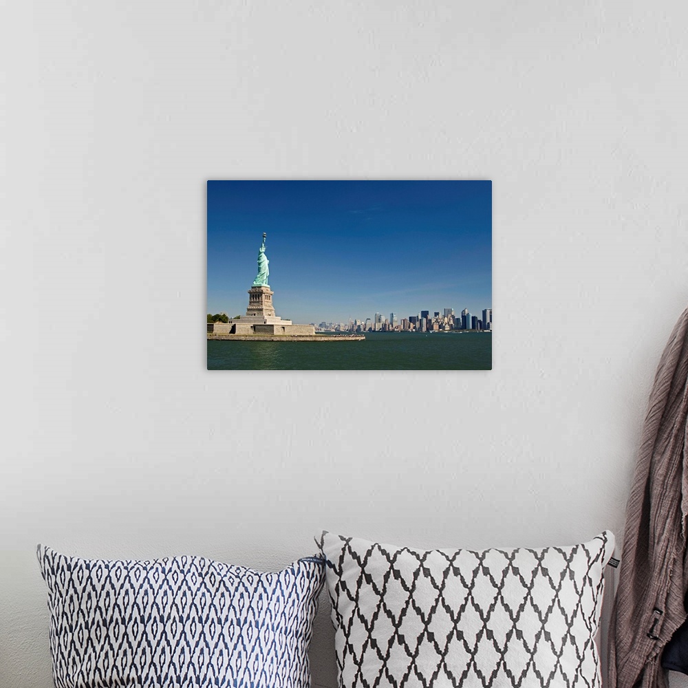 A bohemian room featuring Statue Of Liberty, Liberty Island And New York Skyline