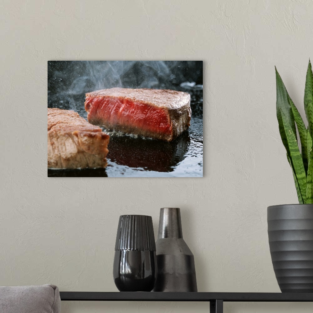 A modern room featuring Steak almost cooked