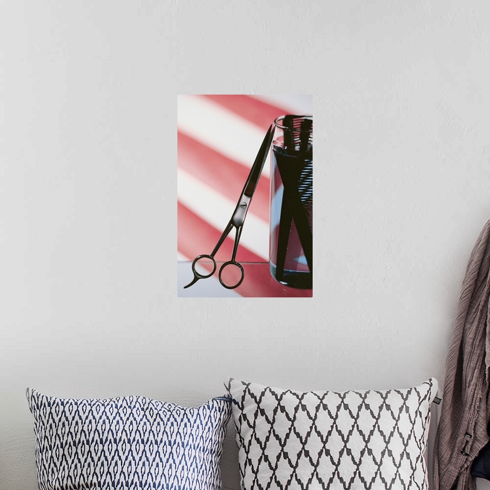 A bohemian room featuring Still life of barbershop pole with scissors and combs