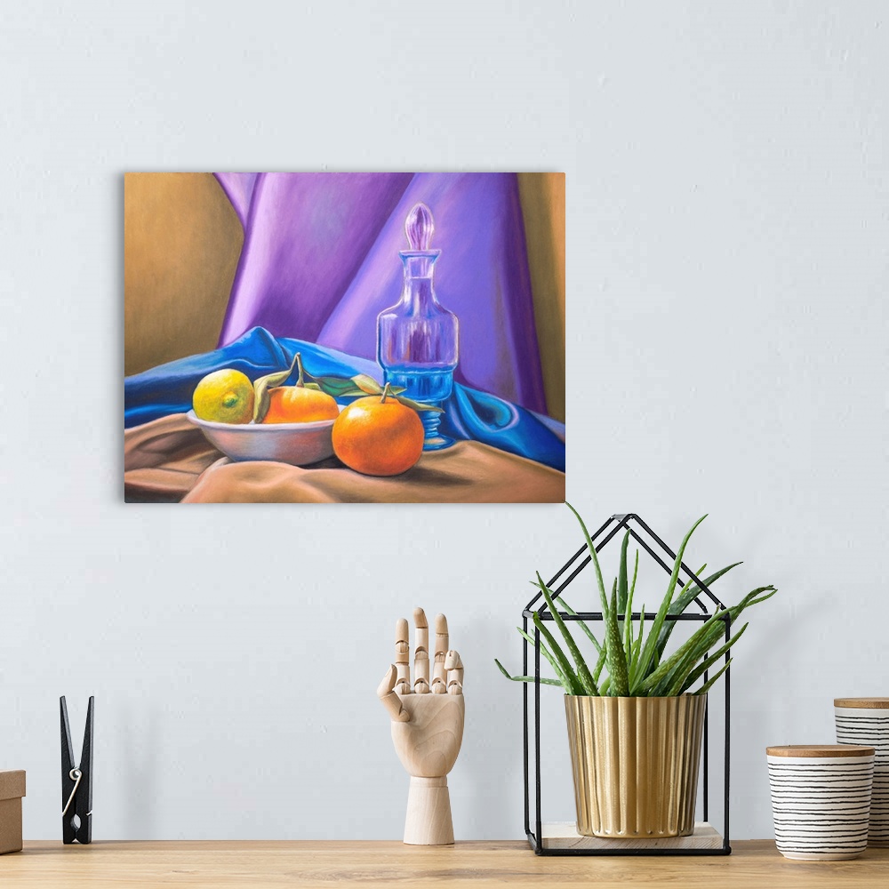 A bohemian room featuring Still life with lemon, tangerines, and some colorful drapery.