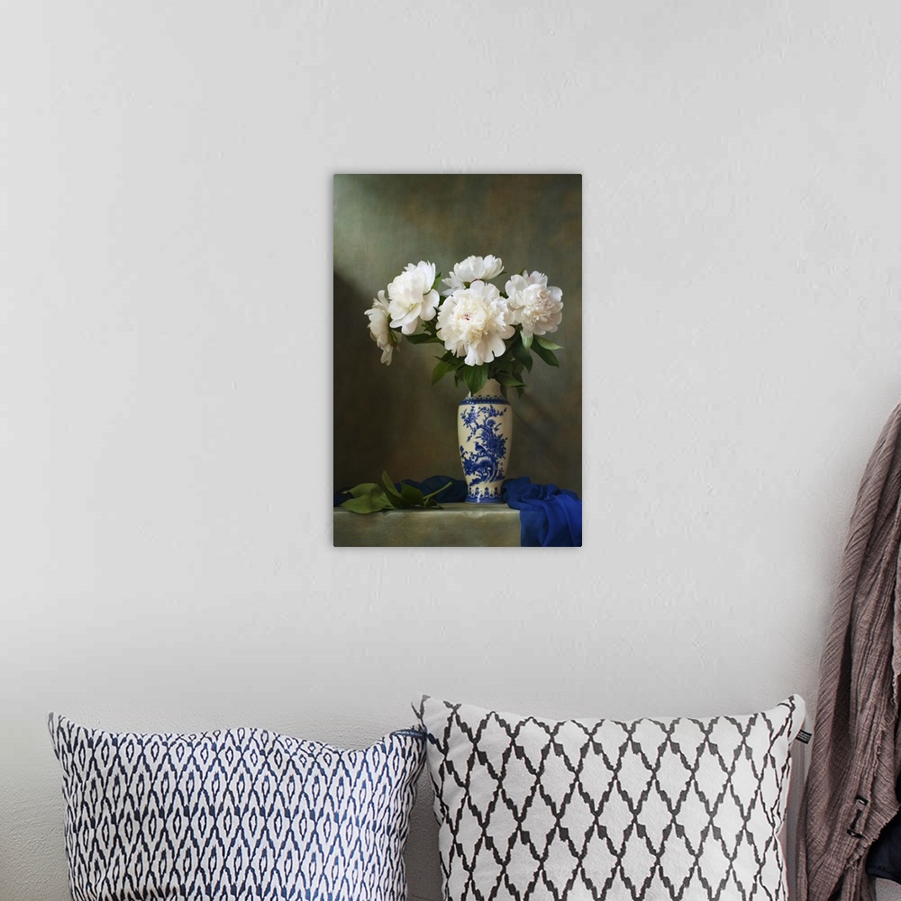 A bohemian room featuring Still life with white peonies in a chinese vase.