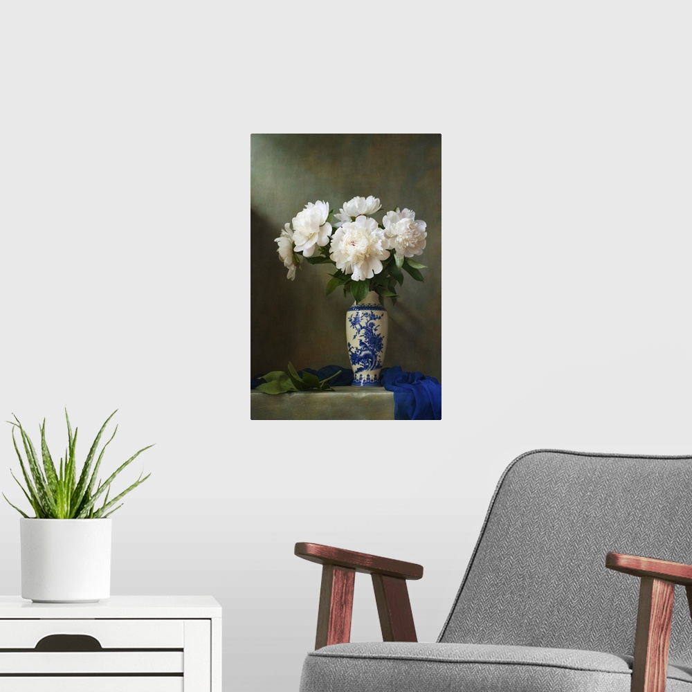 A modern room featuring Still life with white peonies in a chinese vase.