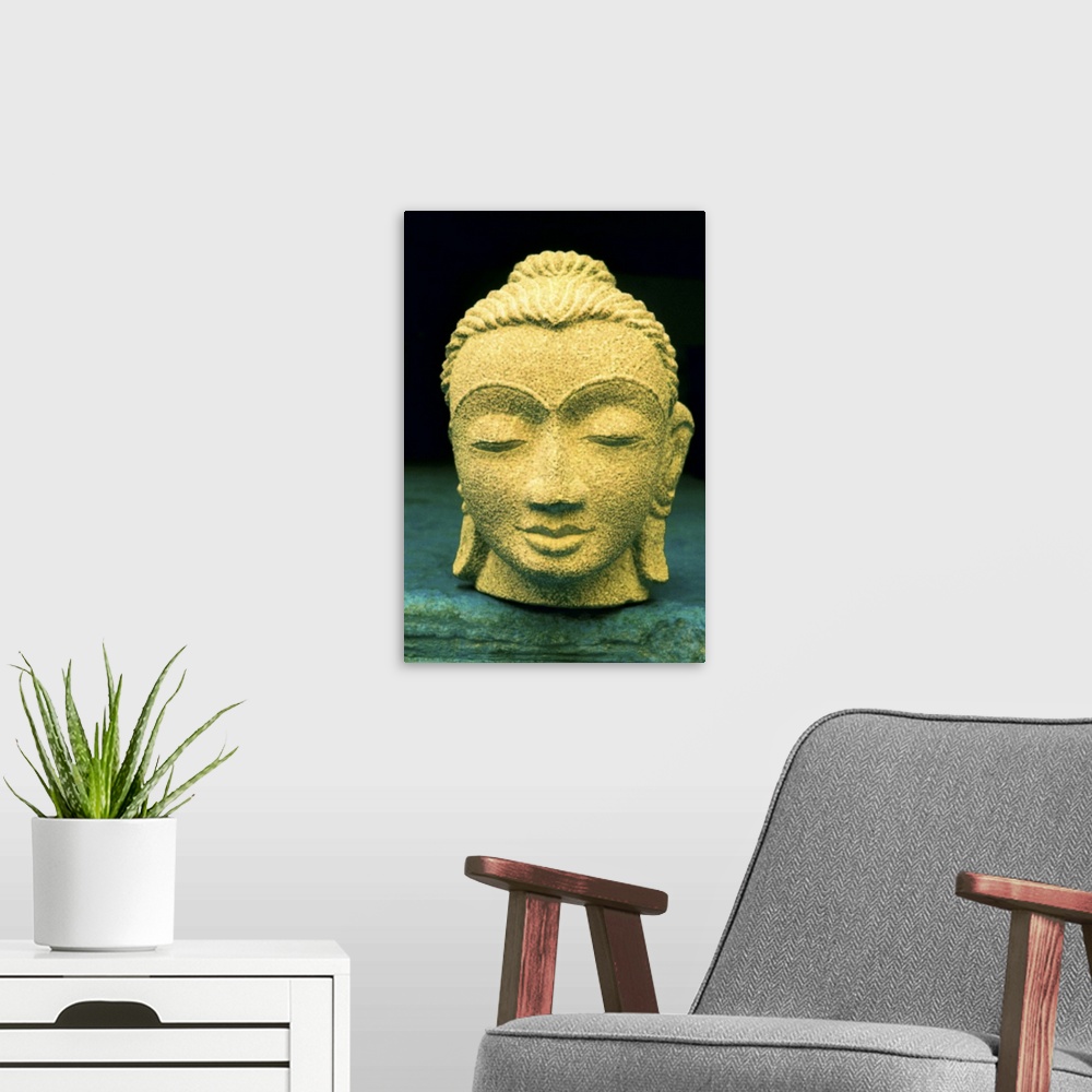 A modern room featuring Stone head of Buddha Gold