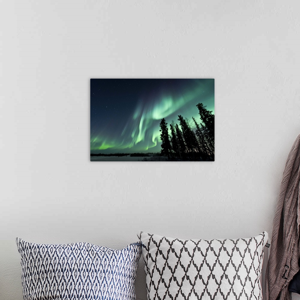 A bohemian room featuring Strong aurora over Walsh Lake, Northwest Territories, Canada.