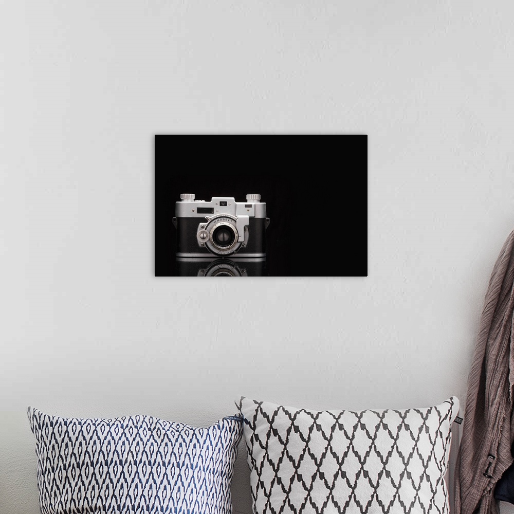 A bohemian room featuring Studio shot of vintage camera