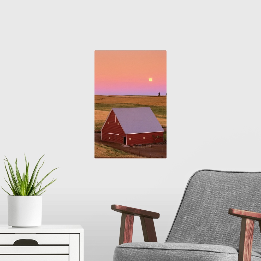 A modern room featuring Sun Setting Behind Barn