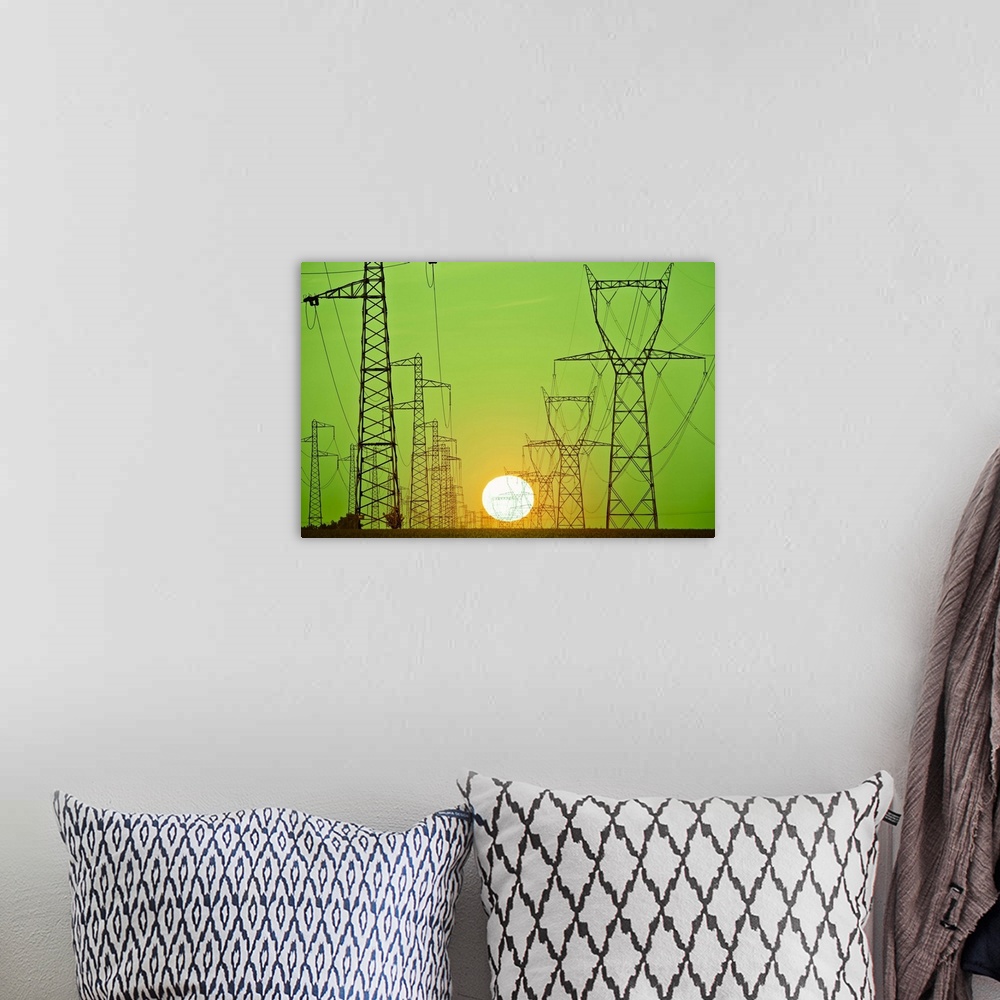 A bohemian room featuring Sun setting behind power lines