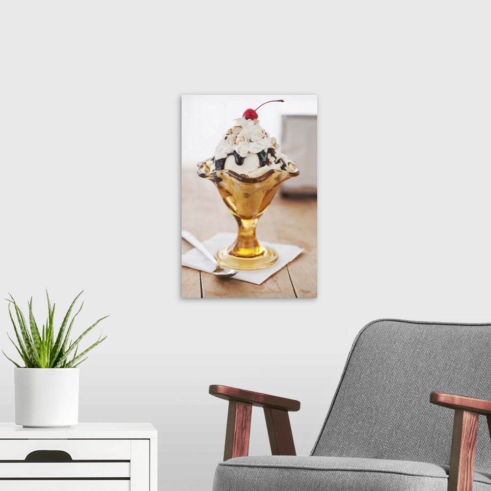A modern room featuring Close up of sundae with cherry on top