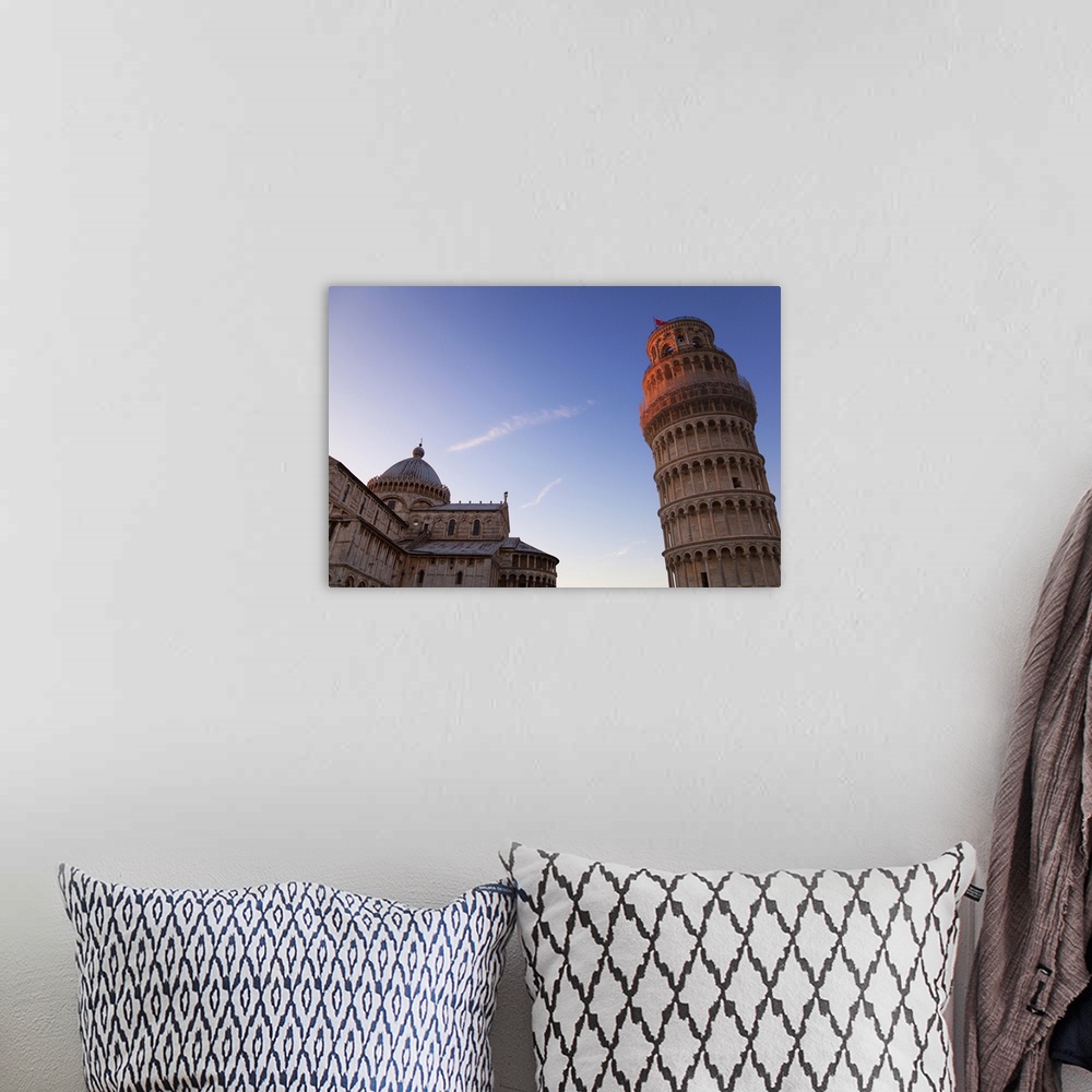 A bohemian room featuring Sunlight on the top of the Leaning tower of Pisa at dusk, with the Duomo