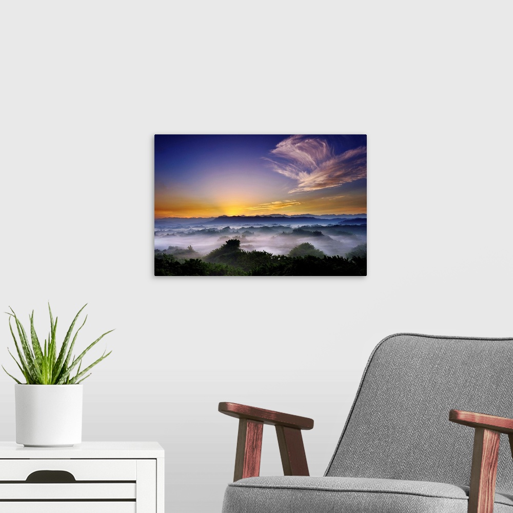 A modern room featuring Mist over mountain at sunrise.
