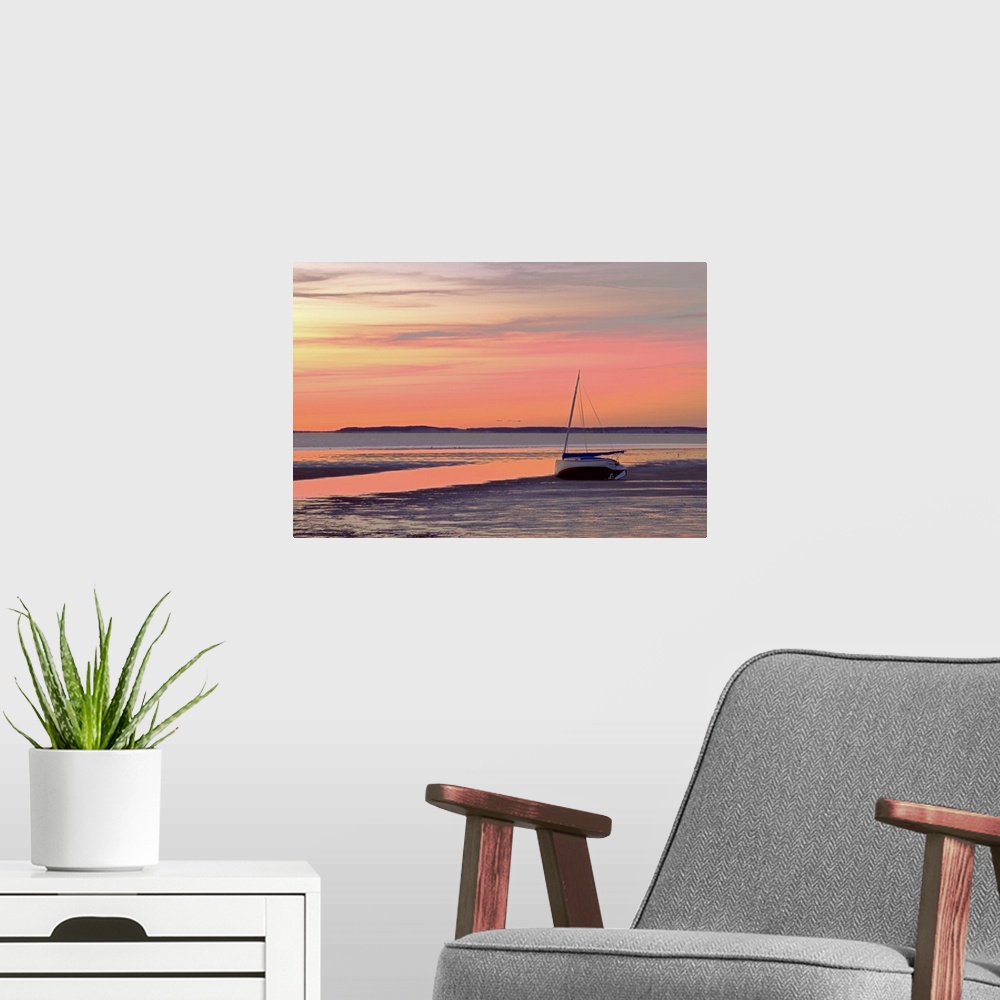 A modern room featuring Sunrise at Cape Cod bay.