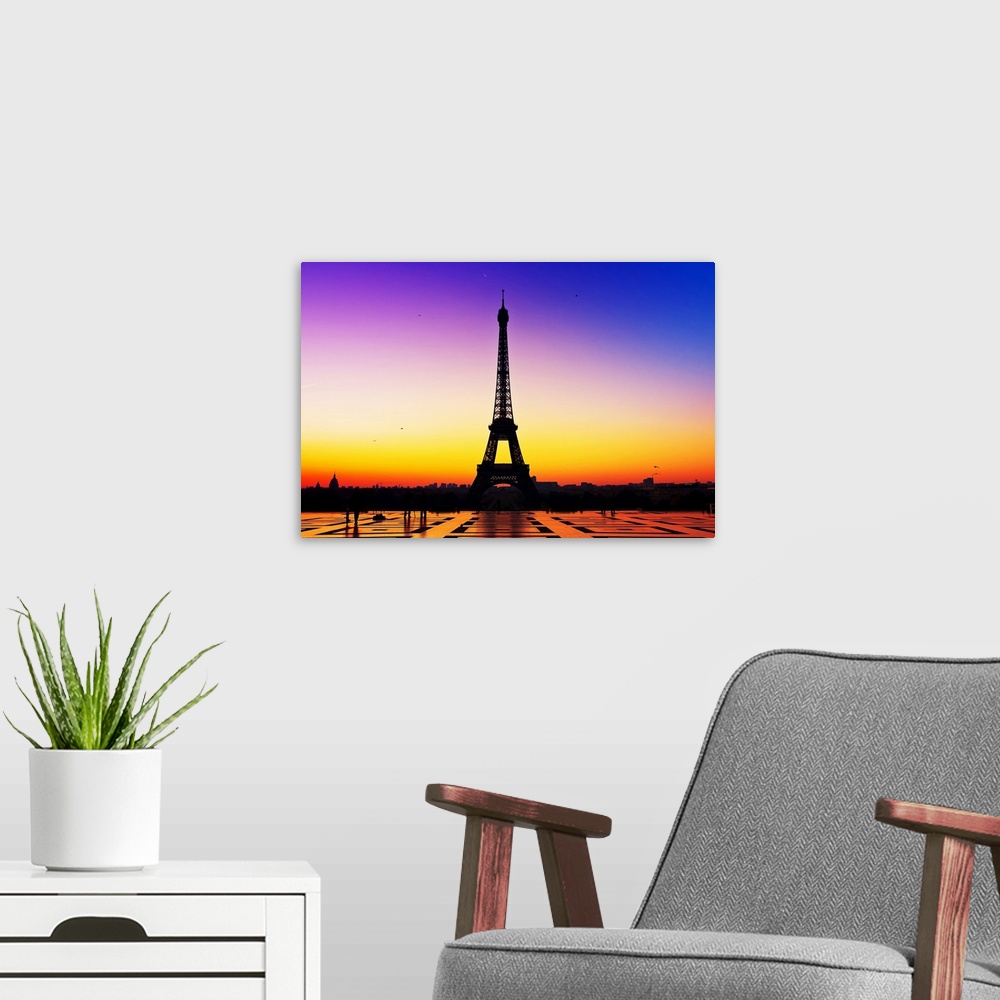 A modern room featuring Sunrise over city of Paris and Eiffel Tower.