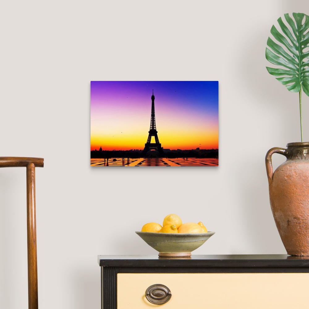 A traditional room featuring Sunrise over city of Paris and Eiffel Tower.