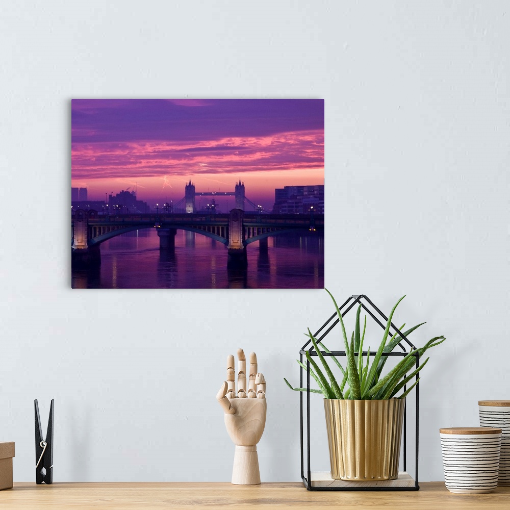 A bohemian room featuring Sunrise over the Thames and Tower Bridge in London.