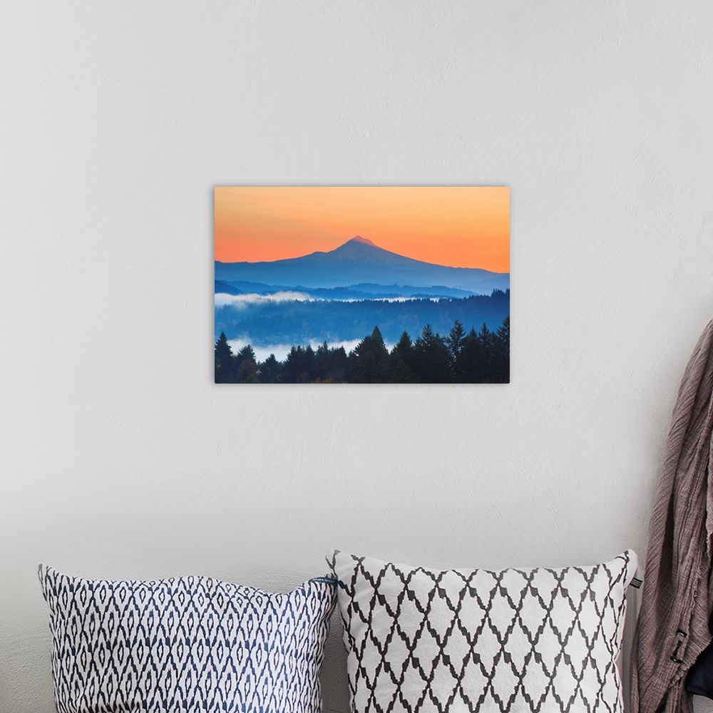 A bohemian room featuring sunrise thru morning fog adds beauty to Mt. Hood from Happy Valley, Oregon, Pacific Northwest.