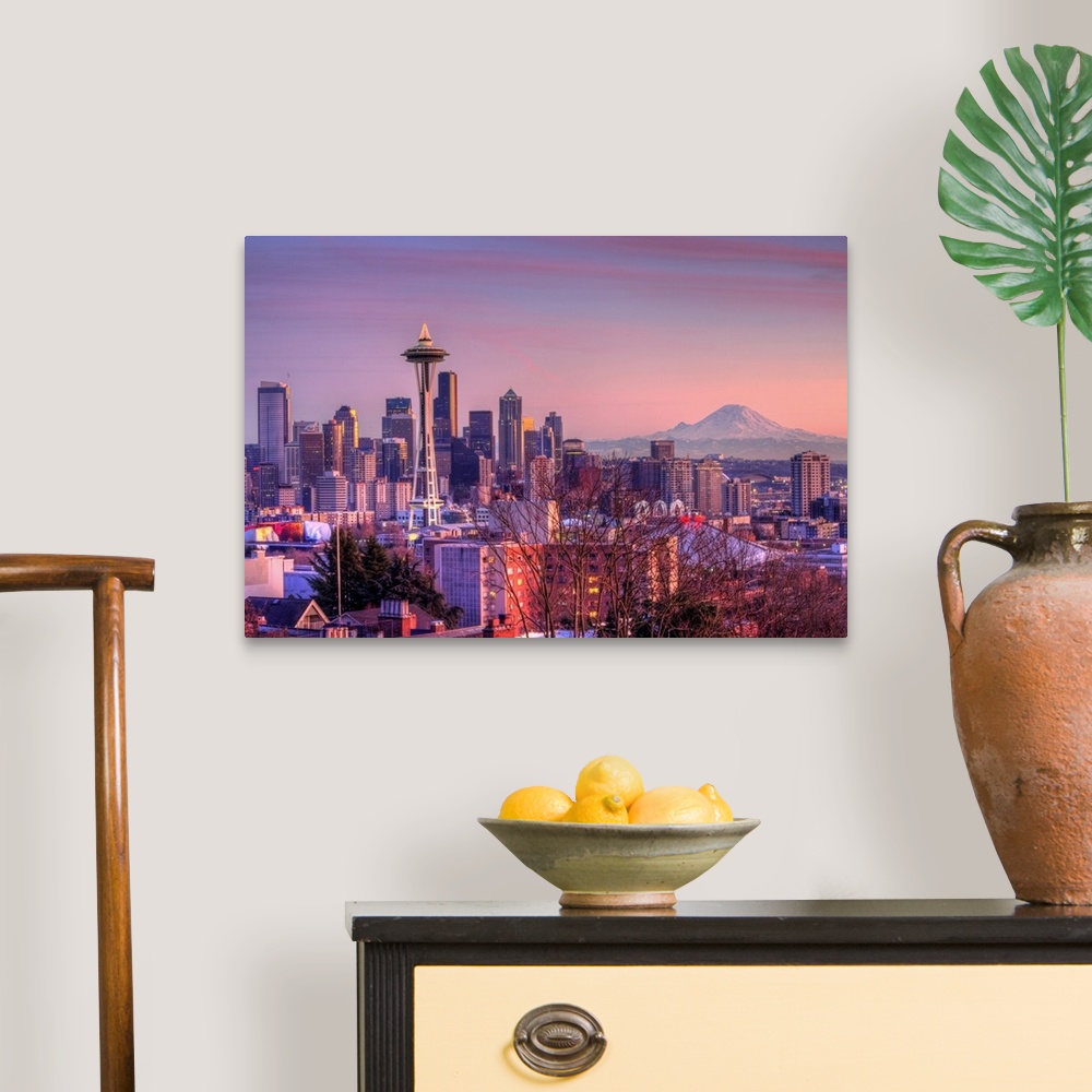 A traditional room featuring Large photo on canvas of downtown Seattle bathed in warm light from a setting sun.