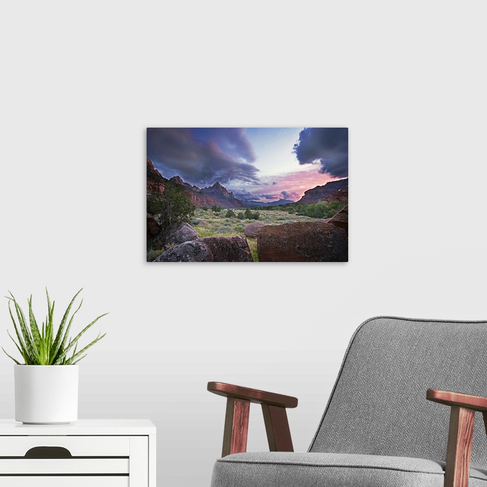 A modern room featuring The sun sets with red clouds in Zion National Park