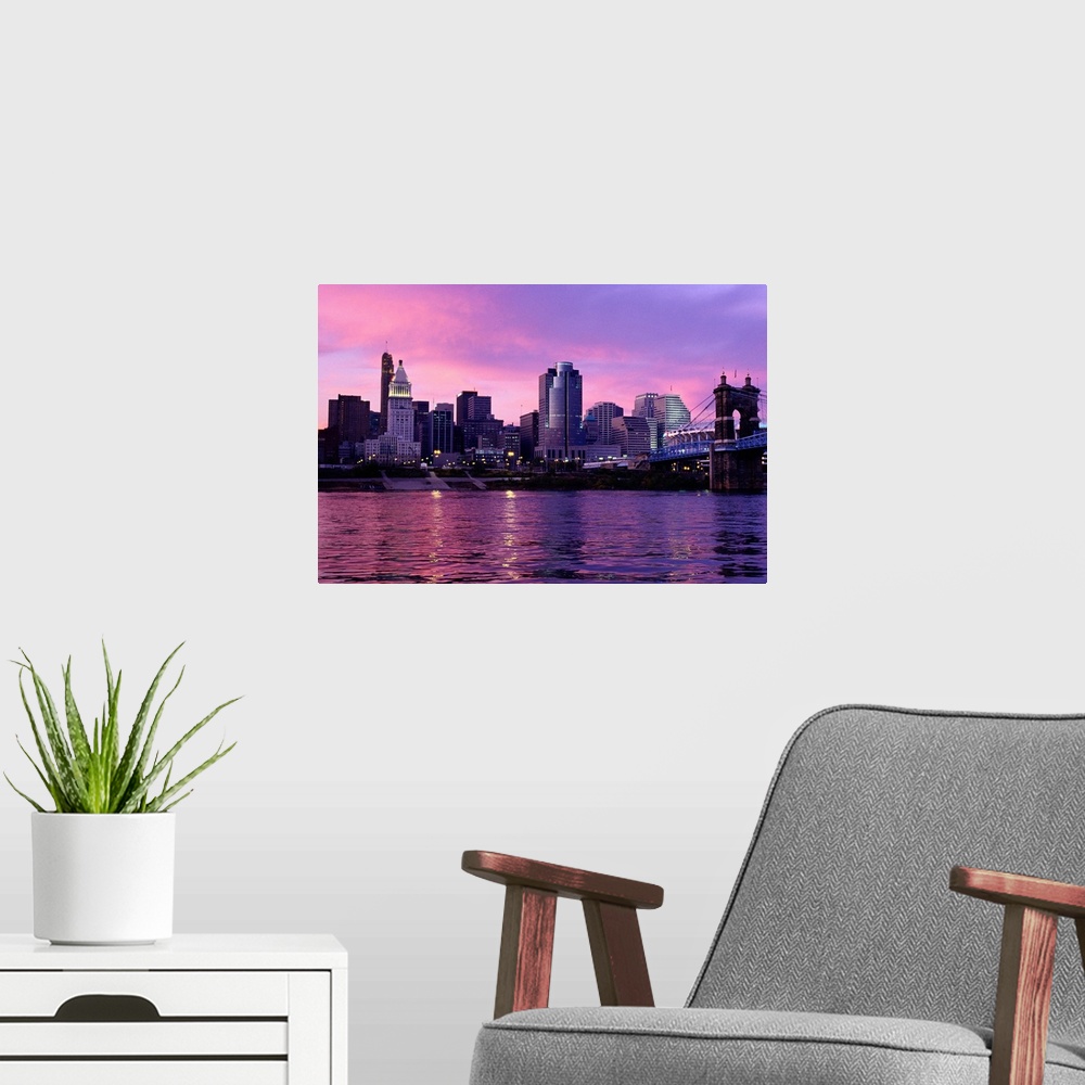 A modern room featuring Sunset Over Cincinnati and the Ohio River