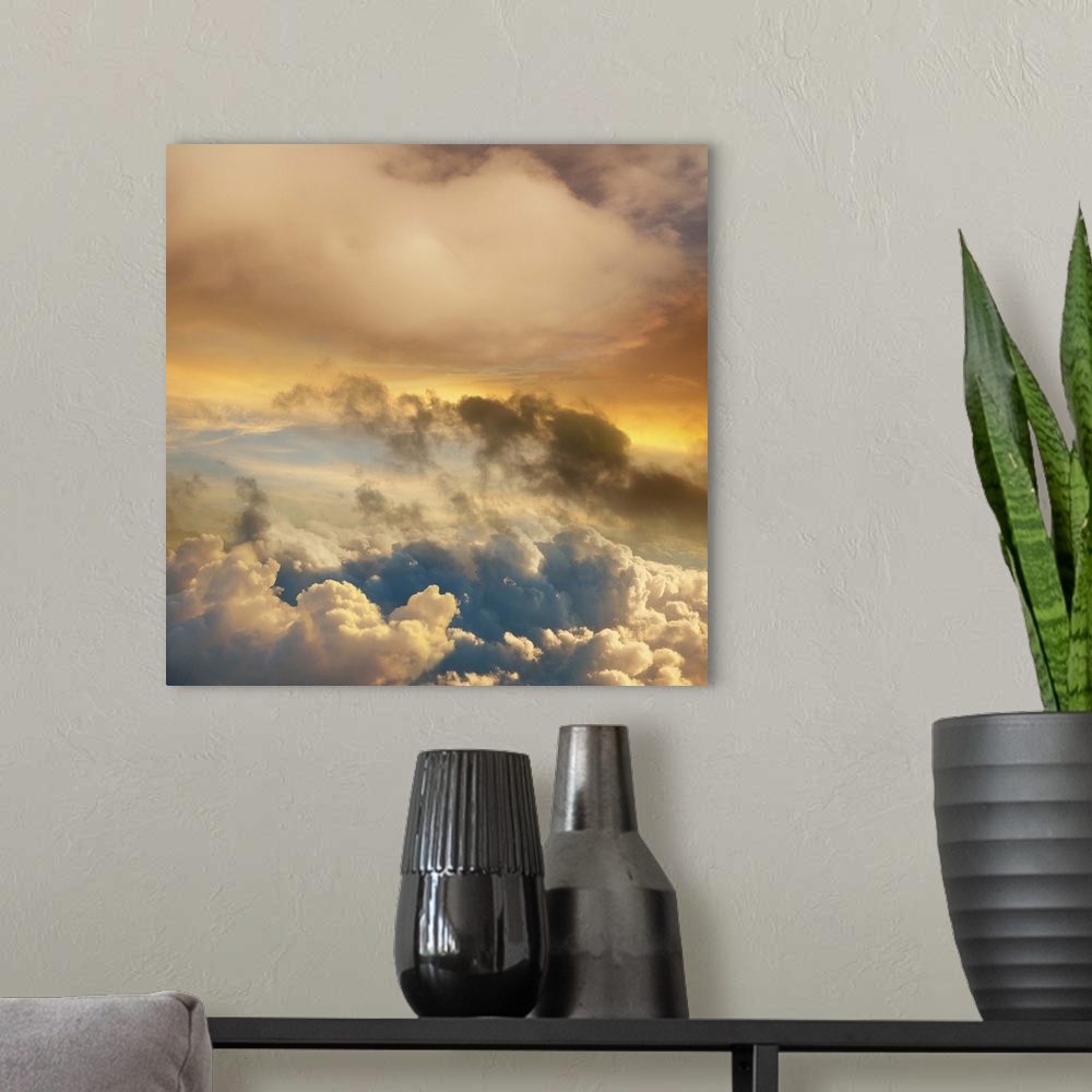 A modern room featuring Sunset viewed from 30,000 feet in a concept photo about cloud computing and opportunity.