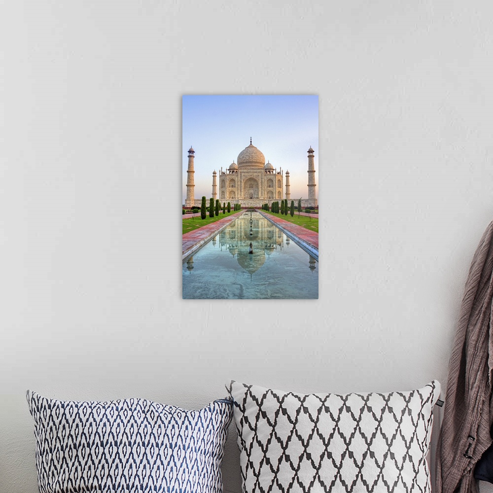 A bohemian room featuring Taj Mahal in Agra, India shot at sunrise with no people in frame.