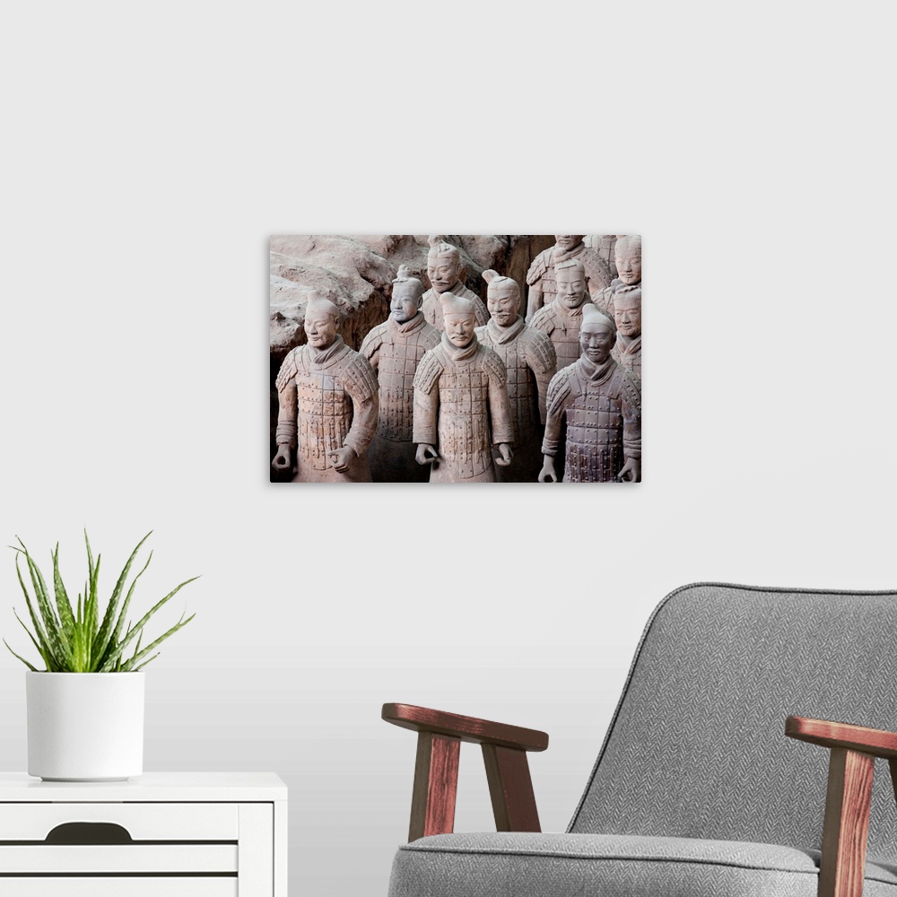 A modern room featuring Terracotta soldiers from the Imperial tomb of Qin Shi Huangdi, the First Emperor of China from 21...
