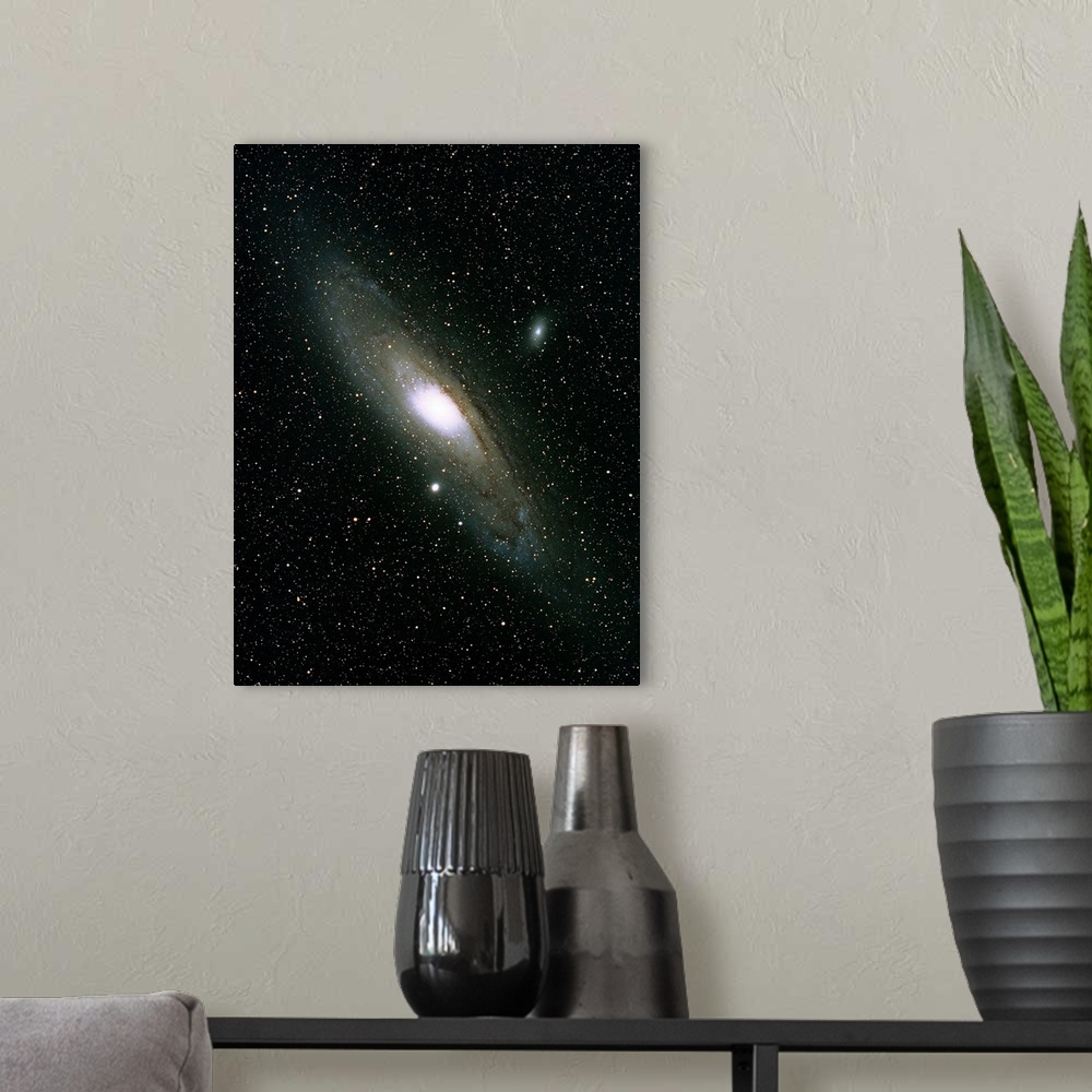 A modern room featuring The Andromeda Galaxy