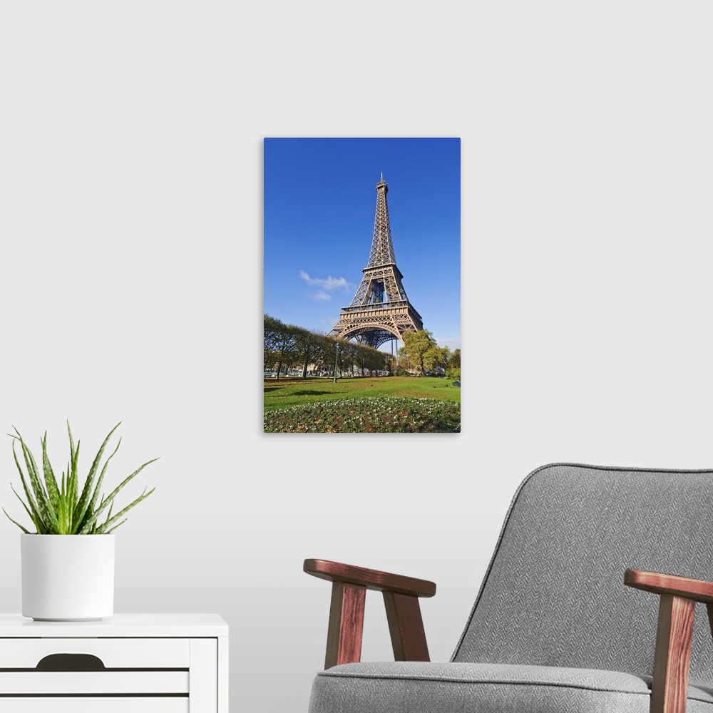 A modern room featuring The Eiffel Tower with early Autumn gardens